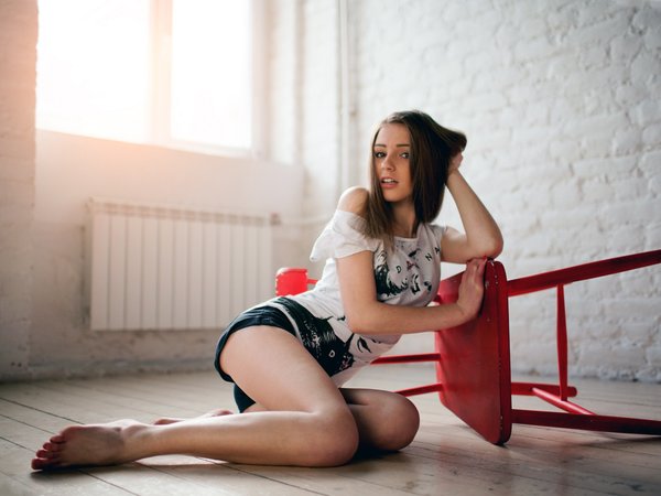 bare shoulders, barefoot, beauty, Brown, brown eyes, chair, face, feet, Galina Dub, Galina Dubenenko, girl, hand in hair, jeans shorts, legs, lips, long hair, looking at camera, looking at viewer, model, mouth, on the floor, photo, portrait, red nails, shorts, sitting, straight hair