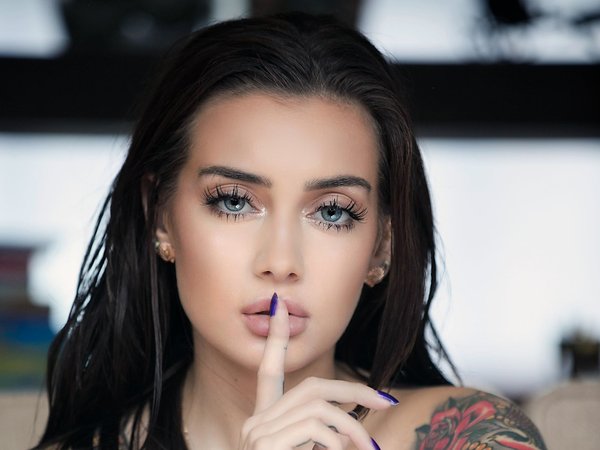bare shoulders, blue eyes, brunette, close up, depth of field, face, finger on lips, girl, lips, long hair, looking at camera, looking at viewer, model, mouth, photo, portrait, straight hair, tattoo