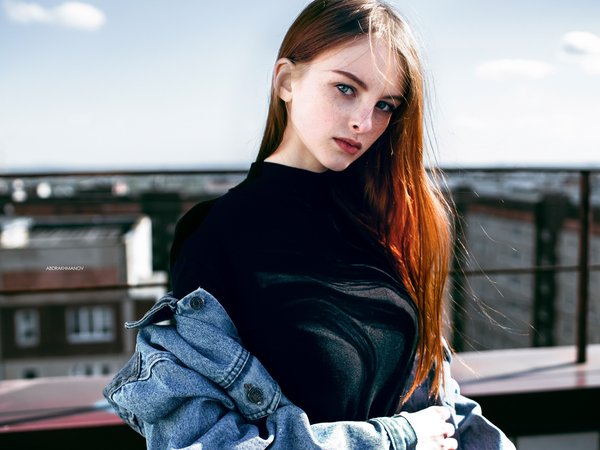 black sweater, blue eyes, brown hair, brunette, depth of field, face, freckles, girl, jacket, jeans jacket, Lenar Abdrakhmanov, lips, lipstick, long hair, looking at camera, looking at viewer, model, mouth, photo, photographer, portrait, rooftops, straight hair, sweater
