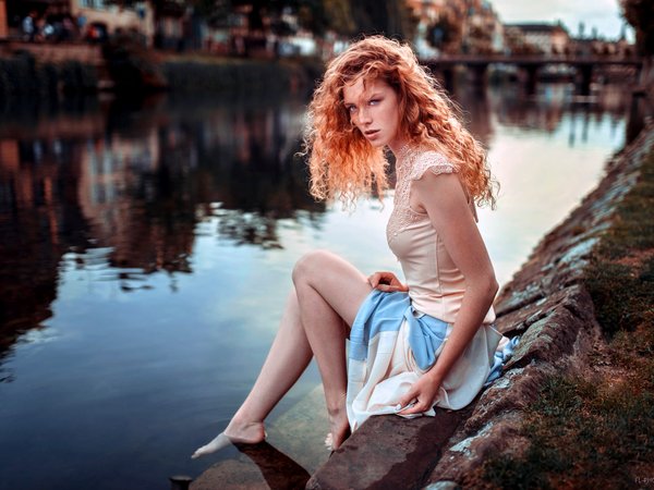 bare legs, bare shoulders, barefoot, blue eyes, Cloé, curly hair, depth of field, dress, face, feet, freckles, girl, legs, lips, Lods Franck, long hair, looking at camera, looking at viewer, model, mouth, photo, photographer, portrait, redhead, river, Riverside, shirt, sitting, skirt, water