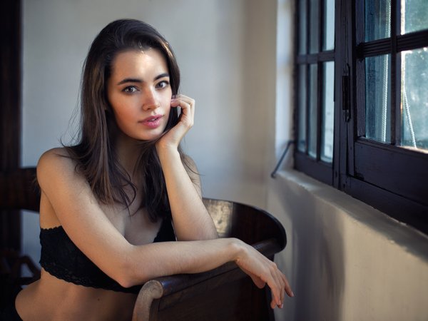 bare shoulders, black top, brown eyes, brunette, face, girl, Lidia Savoderova, lips, looking at camera, looking at viewer, model, mouth, Pablo Canas, photo, photographer, portrait, strap, top, touching face, window