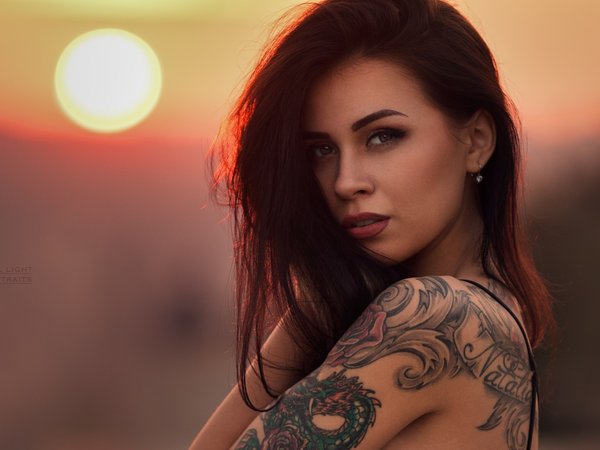 bare shoulders, bokeh, brown eyes, brunette, close up, depth of field, face, girl, lips, lipstick, long hair, looking at camera, looking at viewer, model, mouth, open mouth, photo, photographer, portrait, Robert Chrenka, strap, sun, sunset, tattoo, twilight, wavy hair
