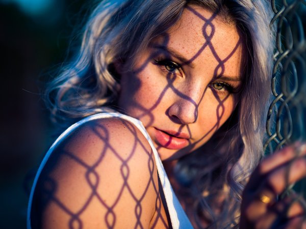 bare shoulders, blonde, fence, girl, green eyes, lips, looking at camera, looking at viewer, model, mouth, parted lips, photo, photographer, portrait, sunlight, Will Hollis