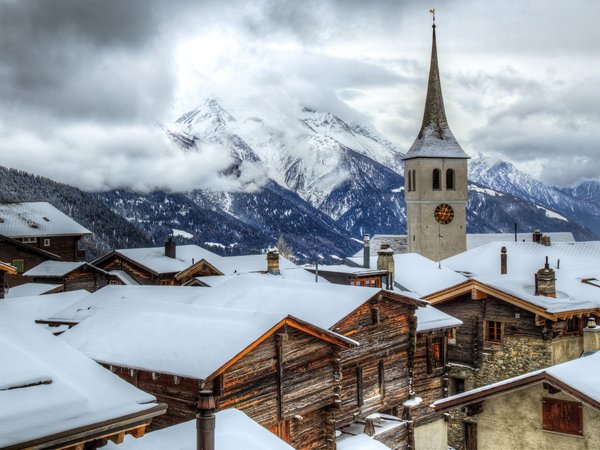 alps, architecture, bell tower, building, church, clock, clouds, houses, landscape, mountains, nature, roofs, rooftops, sky, snow, snowy peak, switzerland, village, winter